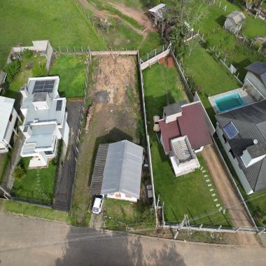 TERRENO COM CASA NO CENTRO DE ROLANTE / COM 628,48m²